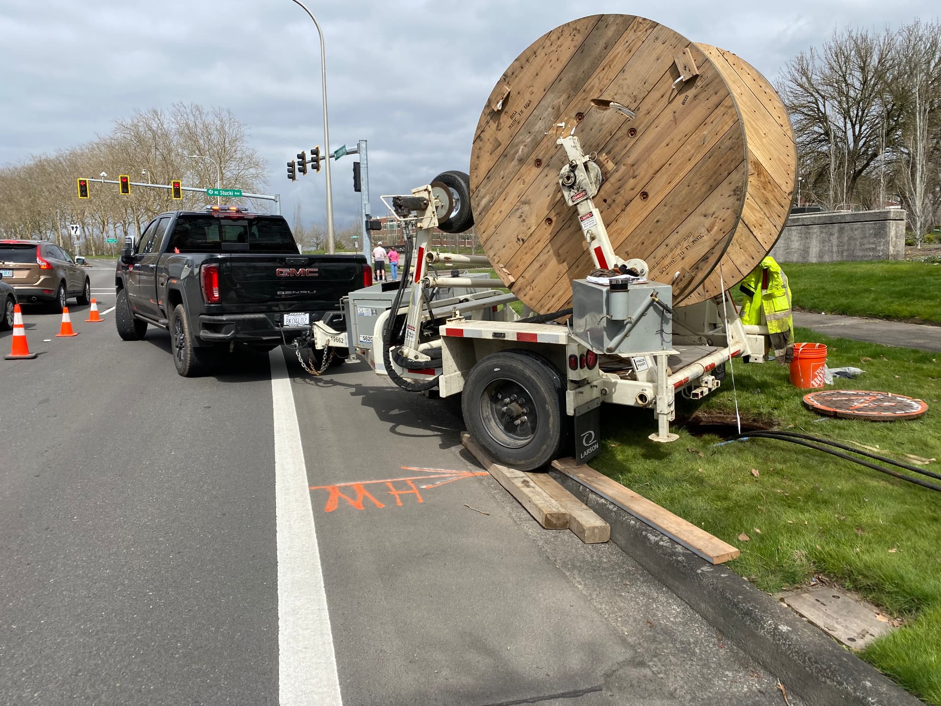 Fiber optic reel trailer deployment on an underground route